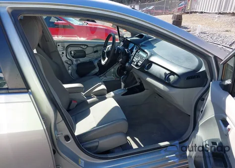 2012 Honda Insight Ex z USA, uszkodzony, nr VIN JHMZE2H77CS002616